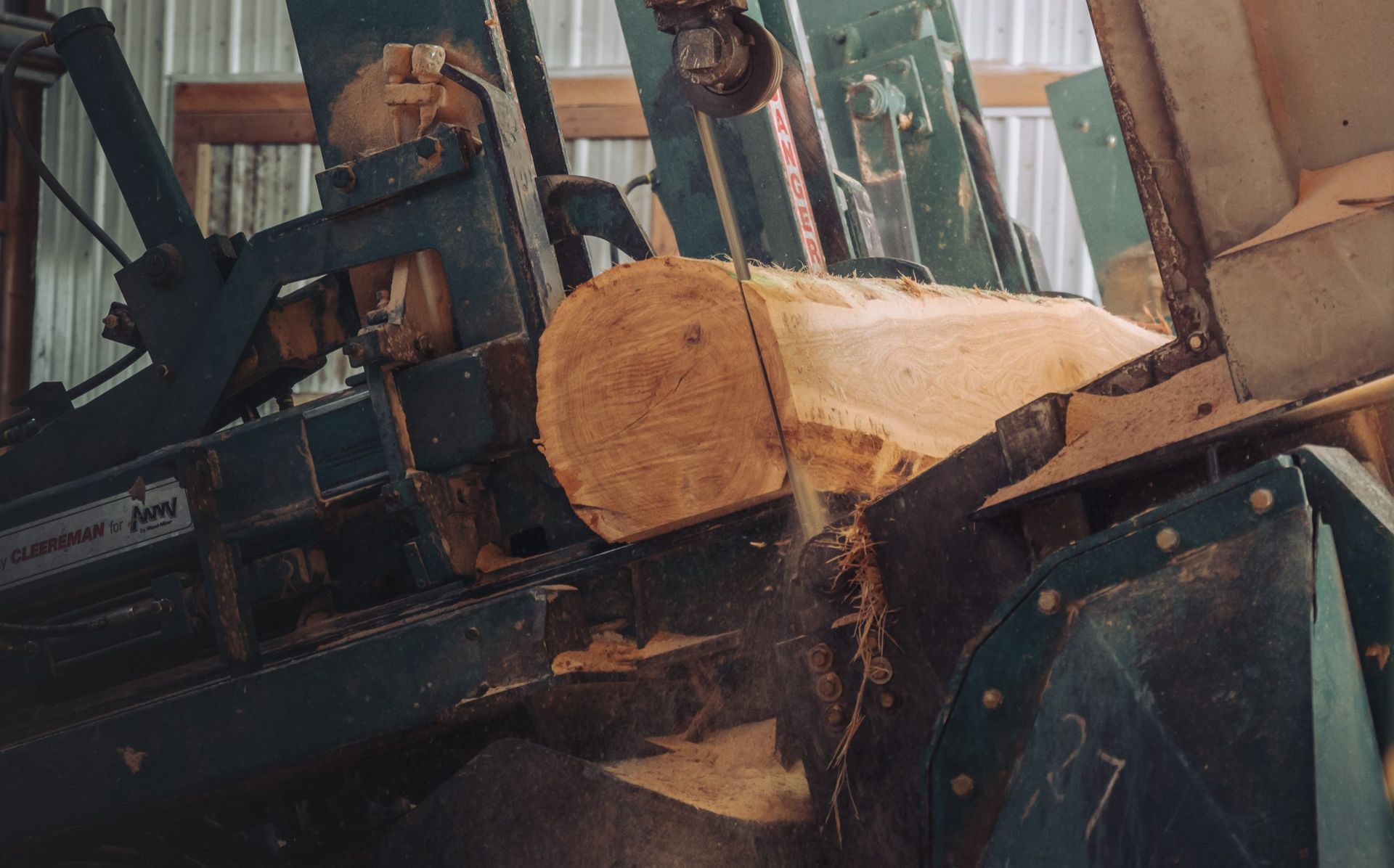 Log being sawn at the Cowan Lumber mill